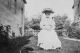 Woman Seated in a Yard Woman Seated in a Yard
